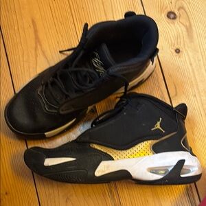Jordan Black and Gold Sneakers Modern Design